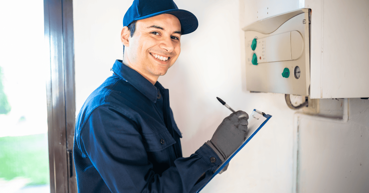 a contractor inspecting an irrigation system control panel
